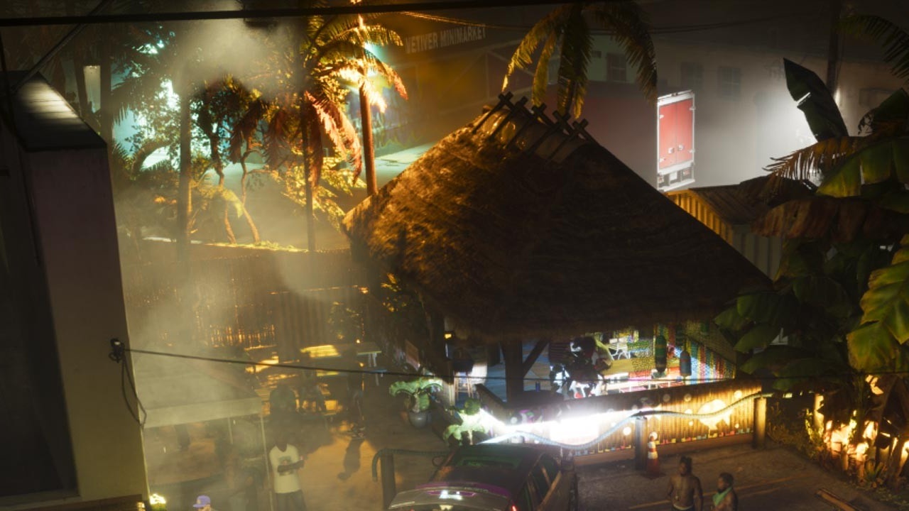 Vetiver Minimarket sign behind a thatched bar next to Conch King at night