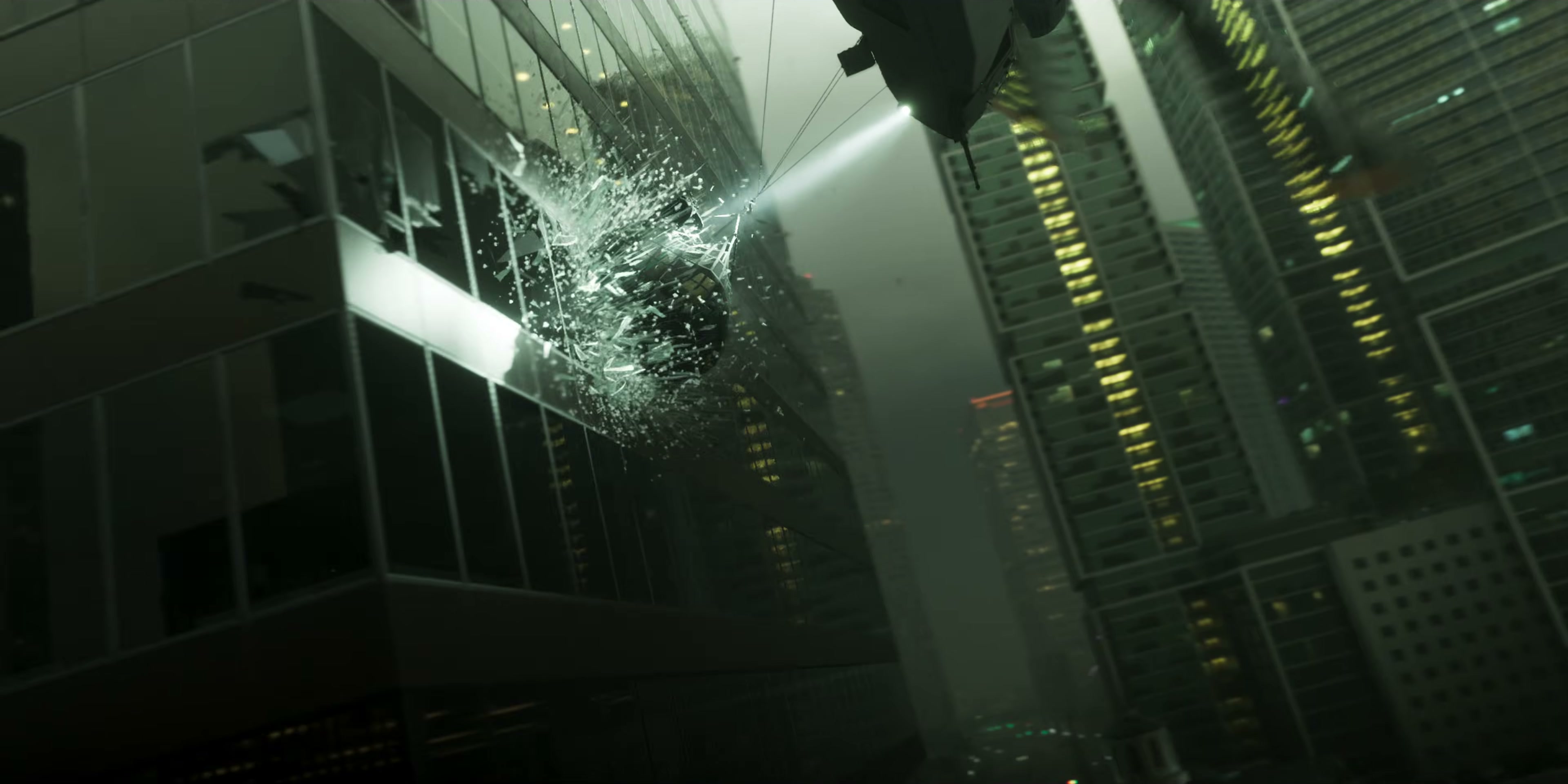 A cargo helicopter smashes its slung load into the glass facade of a Downtown skyscraper