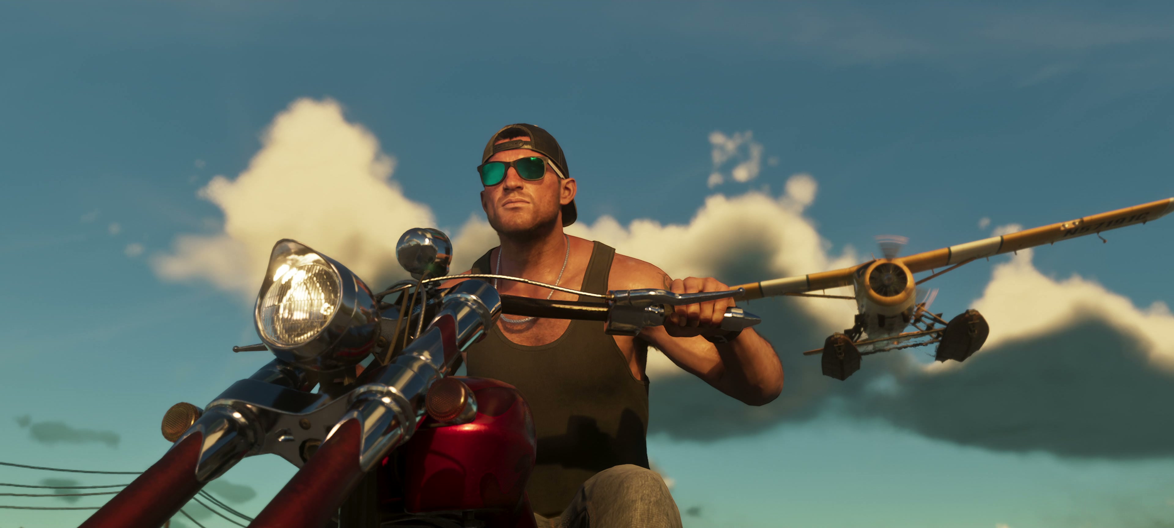 Jason in sunglasses riding a red chopper with a small plane flying behind him, in GTA VI Trailer 2