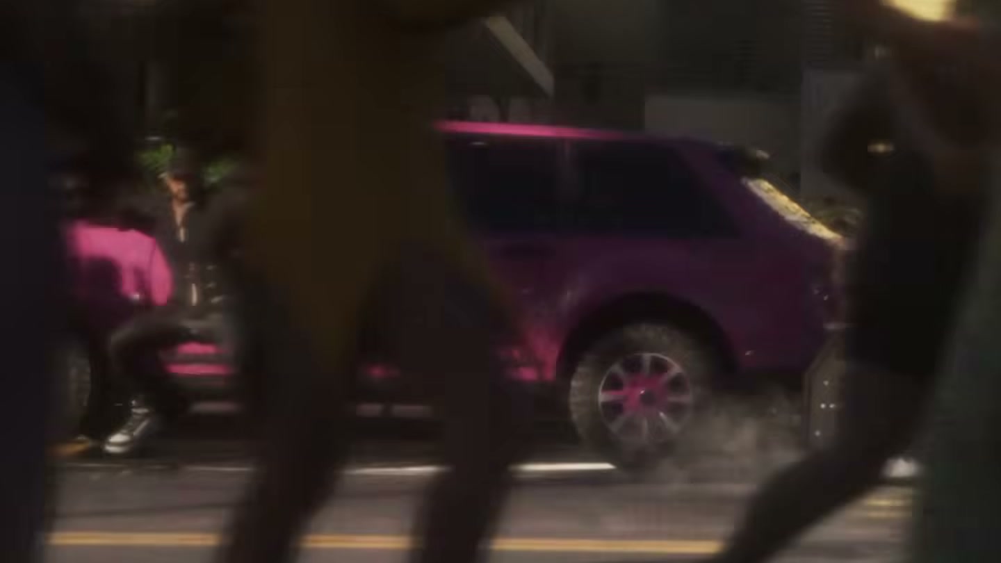 Pink luxury SUV with pink rims on Shore Drive, among pedestrians