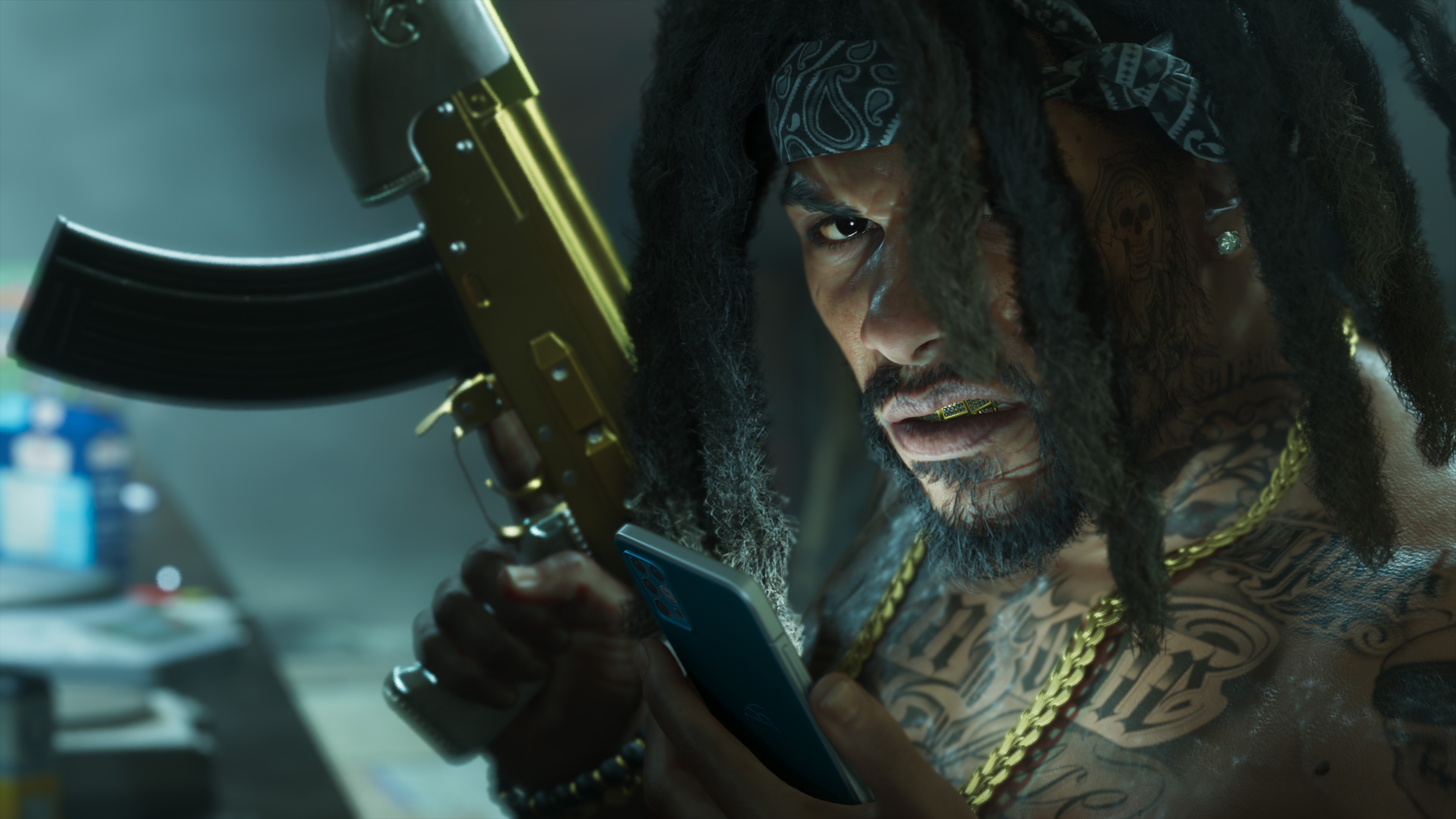 Man with dreadlocks and jewelry holding a rifle, side-lit in a dim room.