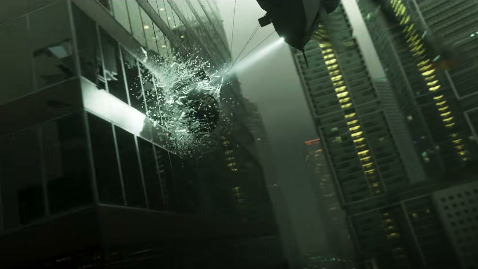 Low angle between towers as something smashes through a glass facade and a helicopter shines a searchlight.