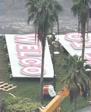 Installation of the "Welcome back to Vice City" sign on the Kaseya Center roof